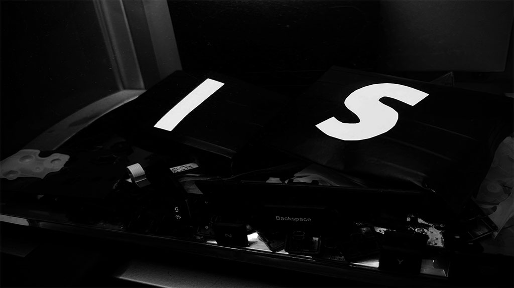 the word is as giant keycaps in a dark setting